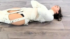 Girl trapped in straitjacket and leg binder