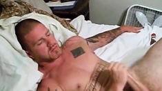 Muscular Hunk Jerks Off His Big Cock for an Admirer