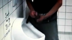 azeri Jerking huge cock at public toilet
