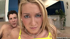 Gorgeous young blonde delivers a blowjob and gets her ass fucked hard